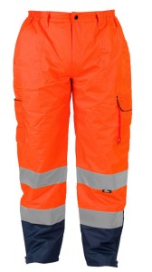 SPODNIE ROBOCZE Z GRUBĄ PIKOWANĄ PODSZEWKĄ, OSTRZEGAWCZE O INENSYWNEJ WIDZIALNOŚCI, 100% POLIESTRU OXFORD 300D POWLEKANEGO PU, PRZECIWDESZCZOWE, DÓŁ NOGAWKI REGULOWANY ZA POMOCĄ ZAMKA, POMARAŃCZOWO-GRANATOWE, MODEL VWJK187O
